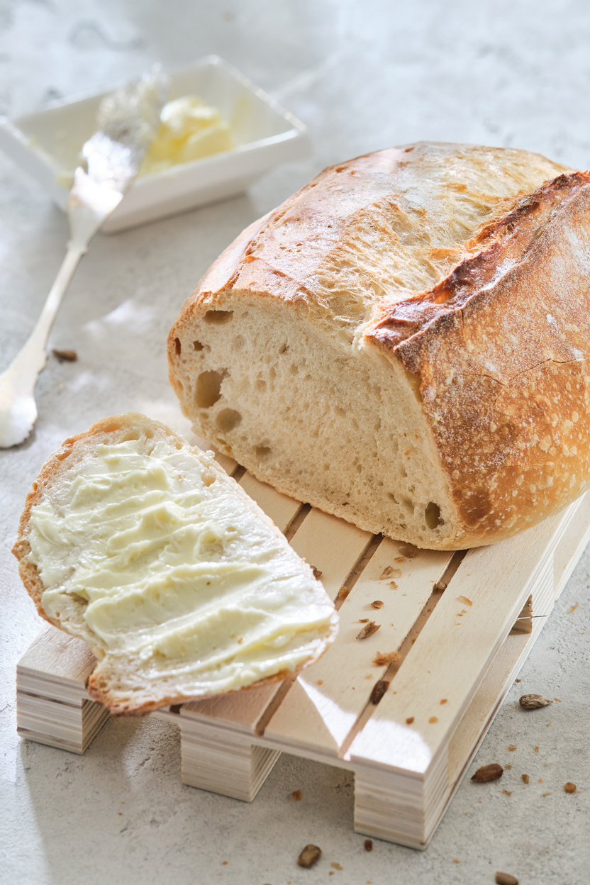 Freshly Baked Traditional Bread. Bread and Butter.